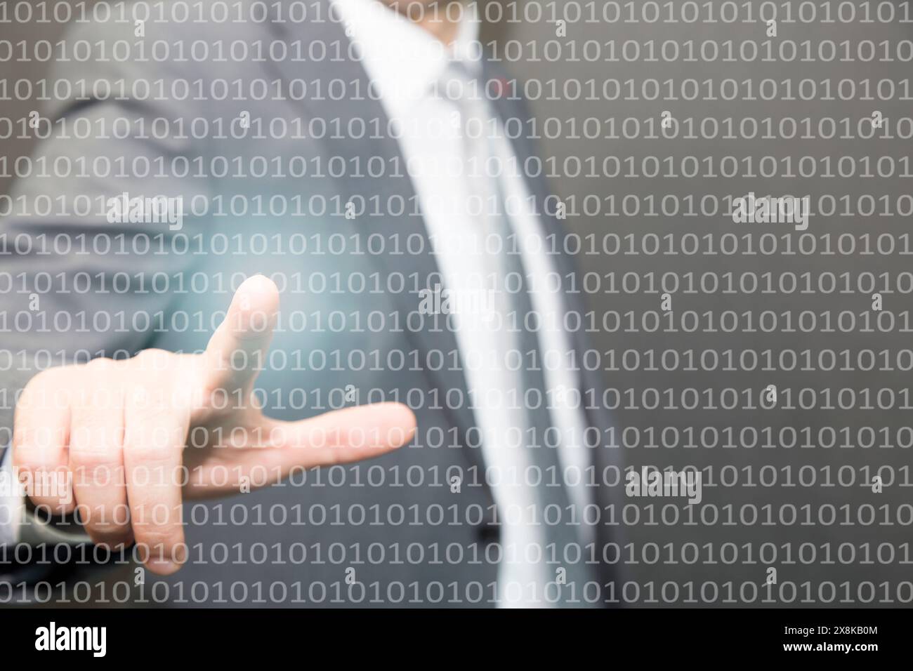 A businessman touching a digital of binary code Stock Photo