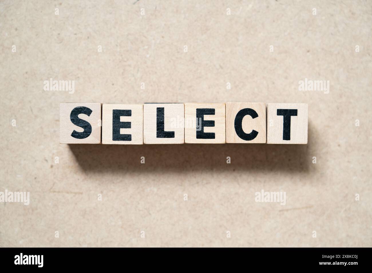 Alphabet letter block in word select on wood background Stock Photo - Alamy