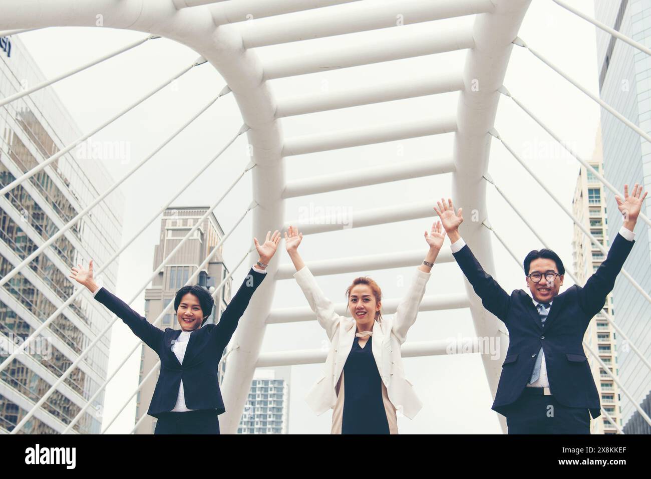 Teamwork Together Concept. Group of diversity people high five on air to greeting power of tag team. Multiethnic people group working togetherness. Vo Stock Photo