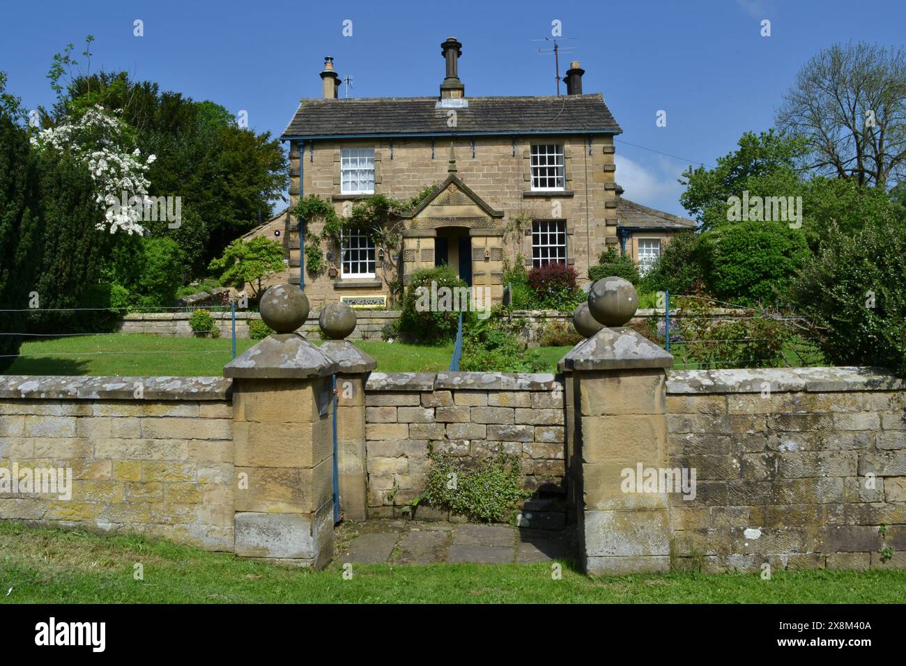 House in Edensor, Chatsworth Estate,Derbyshire, featuring the mandatory