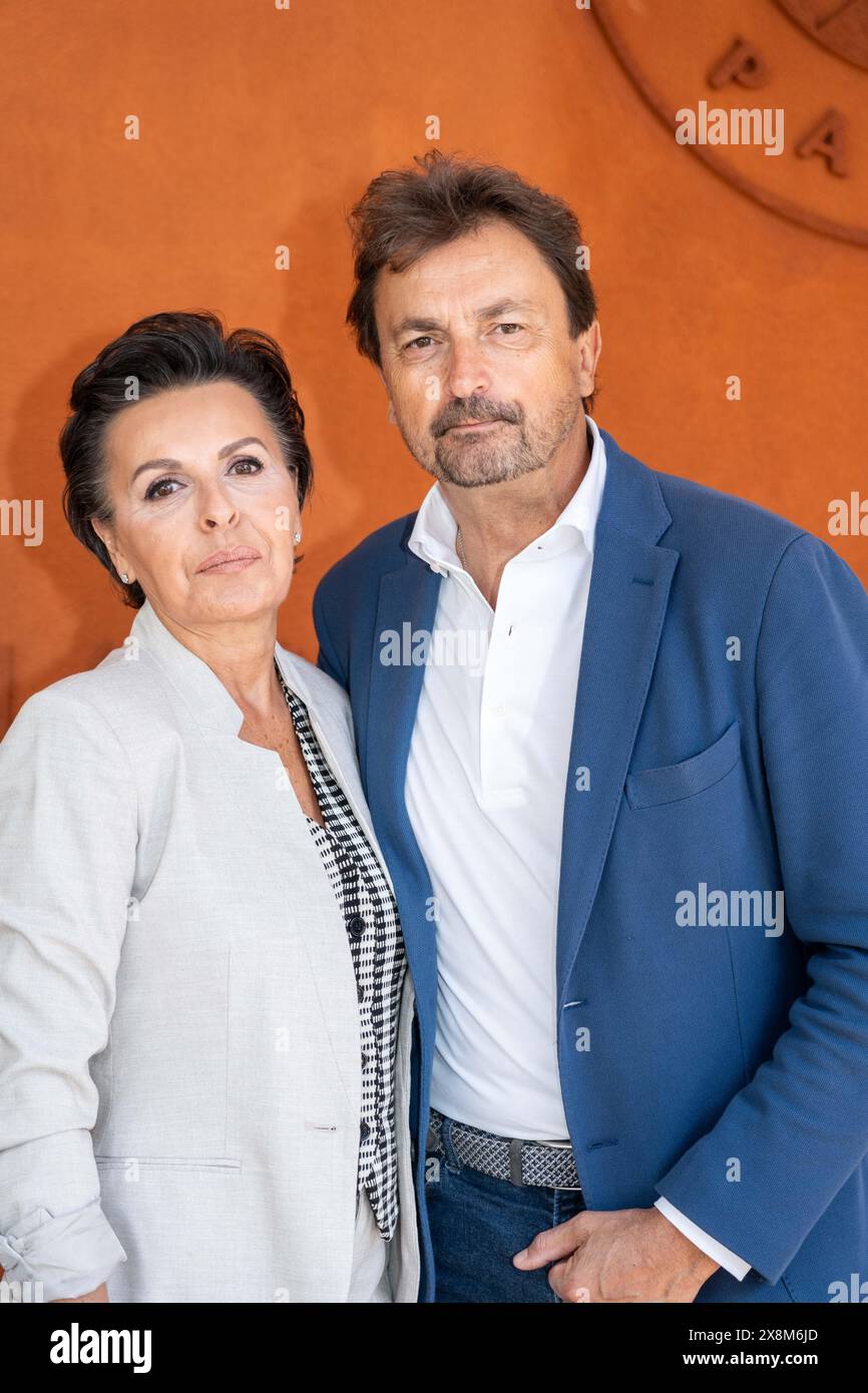 Florentine Leconte and Henri Leconte during the first day of Roland