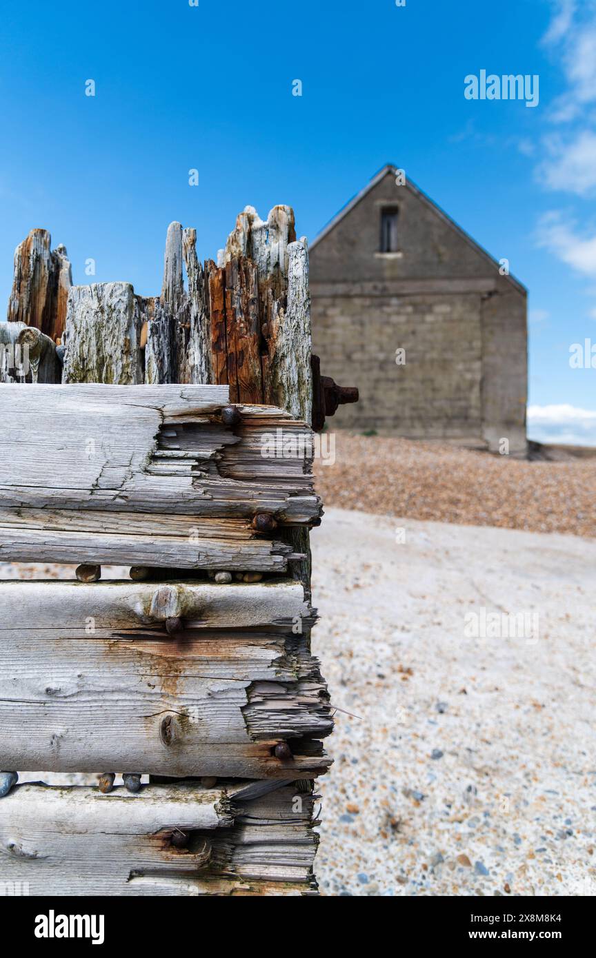 The abandoned grey concrete Mary Stanford Lifeboat House, Rye Harbour