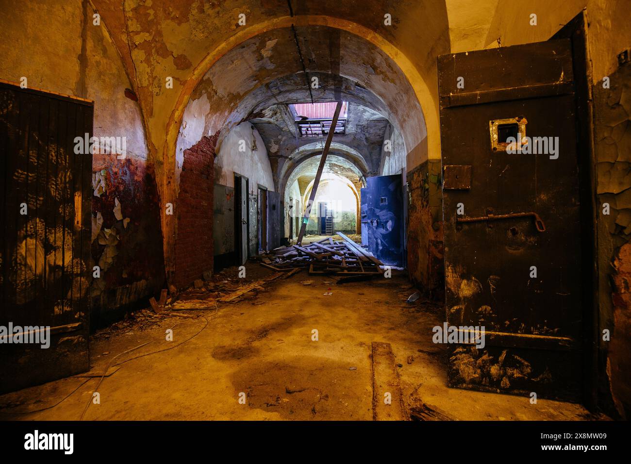 Old dark creepy abandoned prison castle. Stock Photo