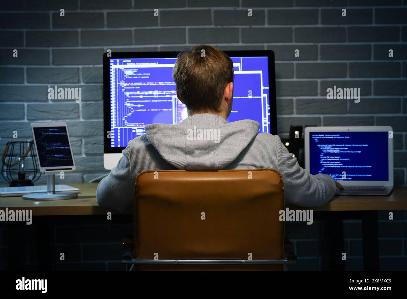Back view male hacker access hi-res stock photography and images - Alamy
