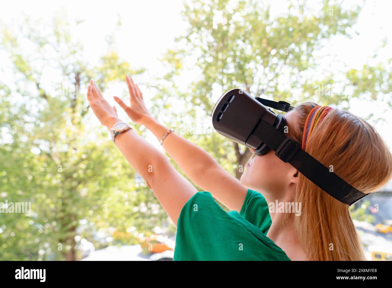 Smiling woman wearing vr hi-res stock photography and images - Alamy