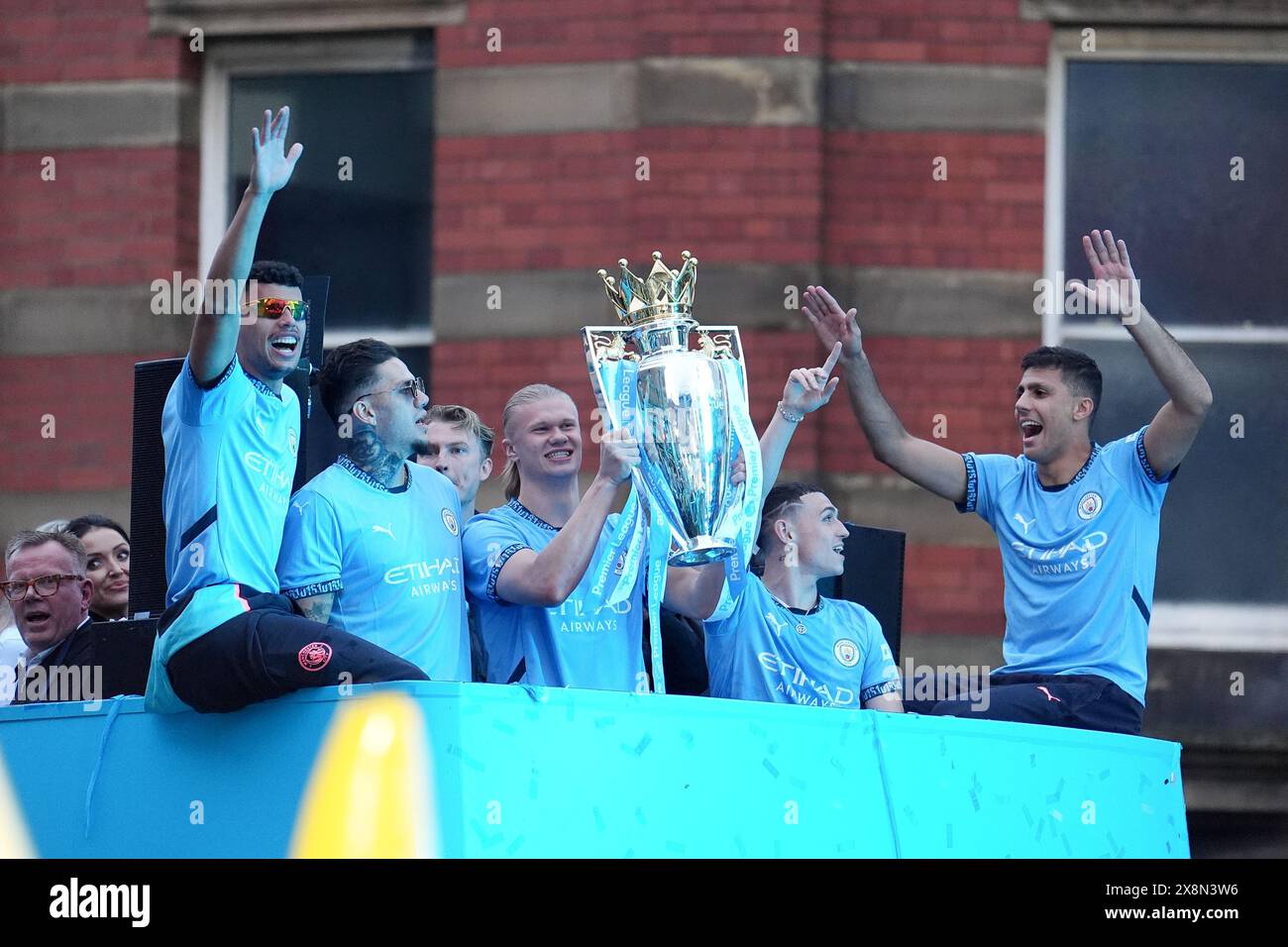 Manchester City's Erling Haaland (centre), Phil Foden and team-mates ...