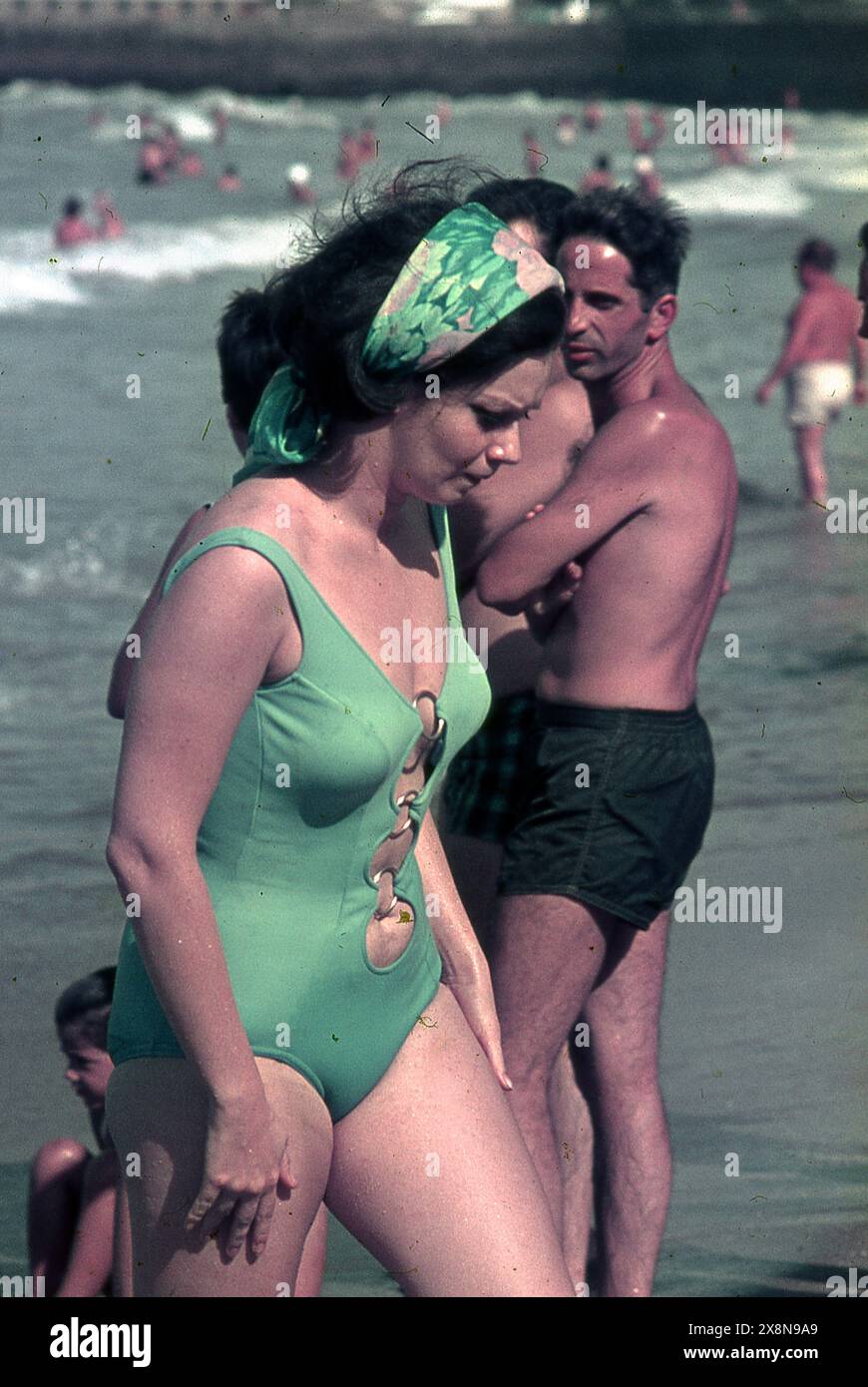 Italian movie actress Gianna Serra takes a sunbath in a Mar del Plata