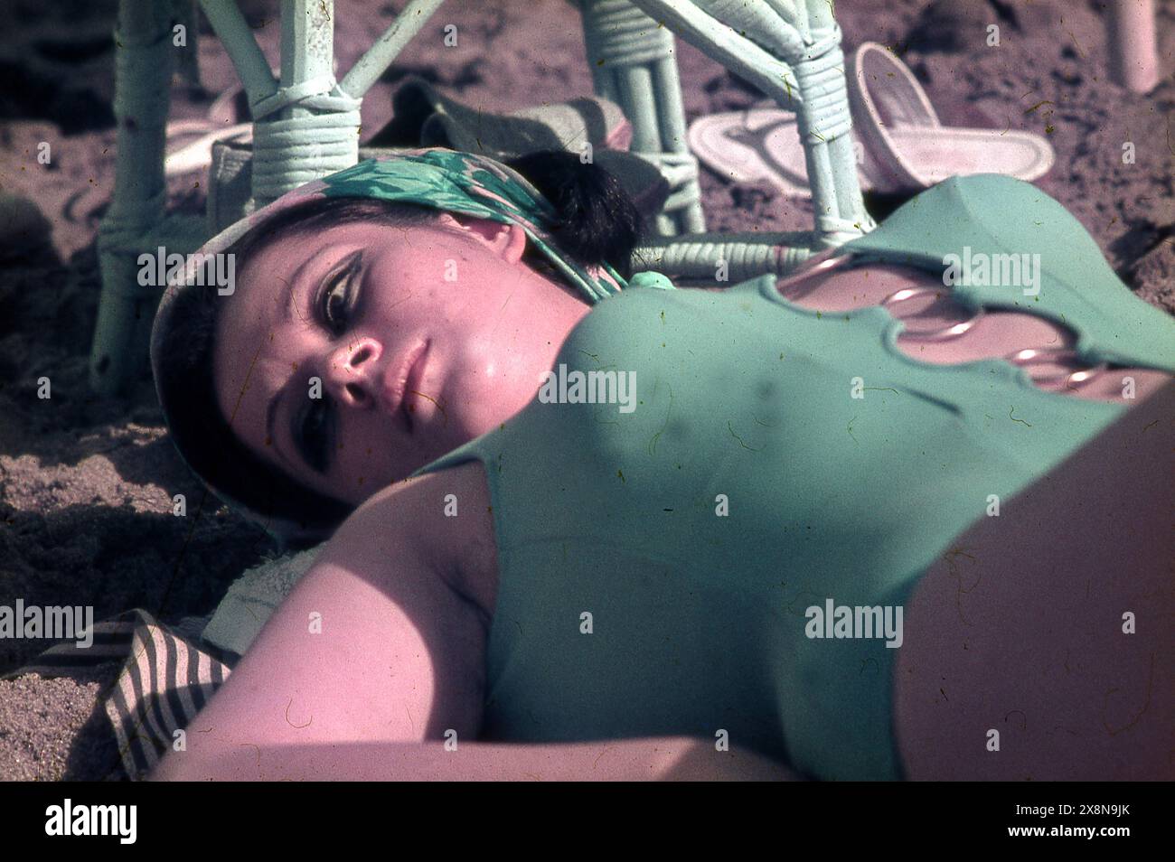 Italian movie actress Gianna Serra takes a sunbath in a Mar del Plata