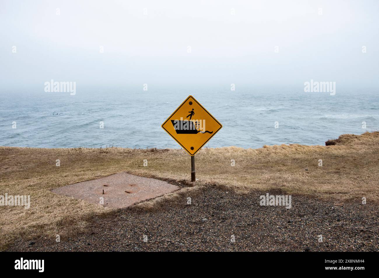 Warning sign at East Point Lighthouse in Prince Edward Island, Canada ...