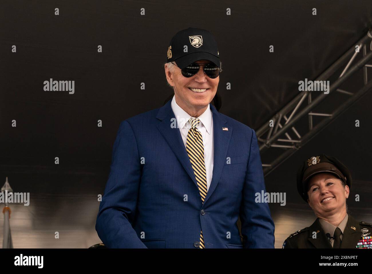 West Point, New York, USA. 25th May, 2024. President Joe Biden Jr. smiles as graduates celebrate after receiving diplomas during U.S. Military Academy's Class of 2024 graduation ceremony at West Point, NY. President Joe Biden delivered commencement speech. He reiterated US support for Ukraine however mentioned that no US military will be deployed to Ukraine. He mentioned the military delivering humanitarian aid to the people of Gaza. 1,231 cadets entered West Point in 2020 and 1, 036 graduated. (Credit Image: © Lev Radin/Pacific Press via ZUMA Press Wire) EDITORIAL USAGE ONLY! Not for Stock Photo