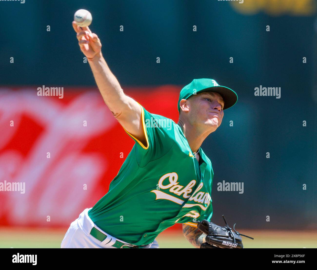 Oakland Athletics starting pitcher Aaron Brooks (53) throws against the