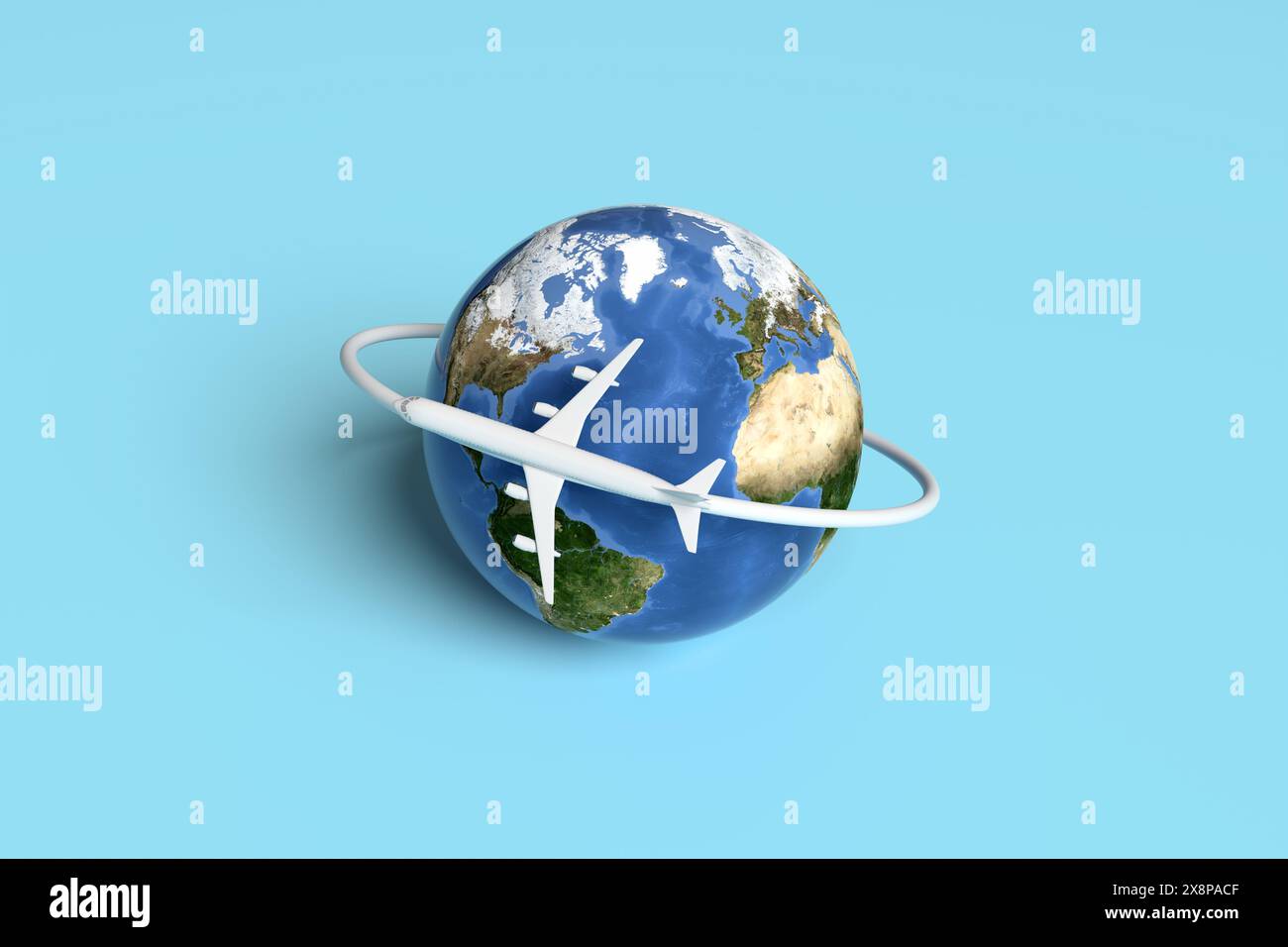 Model commercial airplane flying around the globe. World travel ...