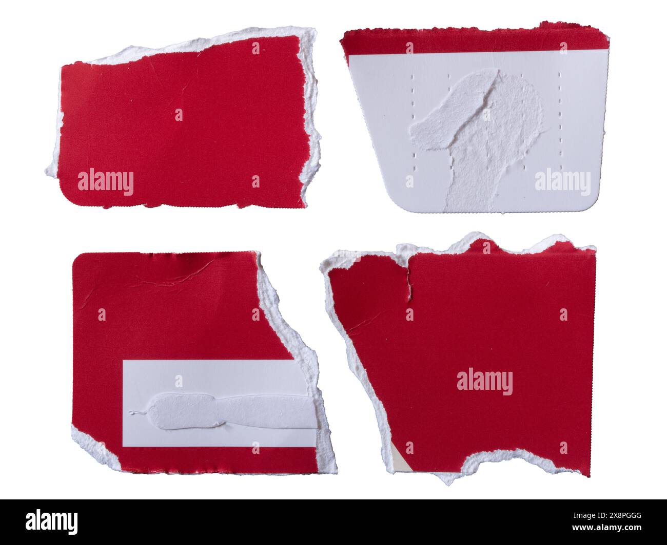 Red and white paper torn from a box packaging on white background with ...