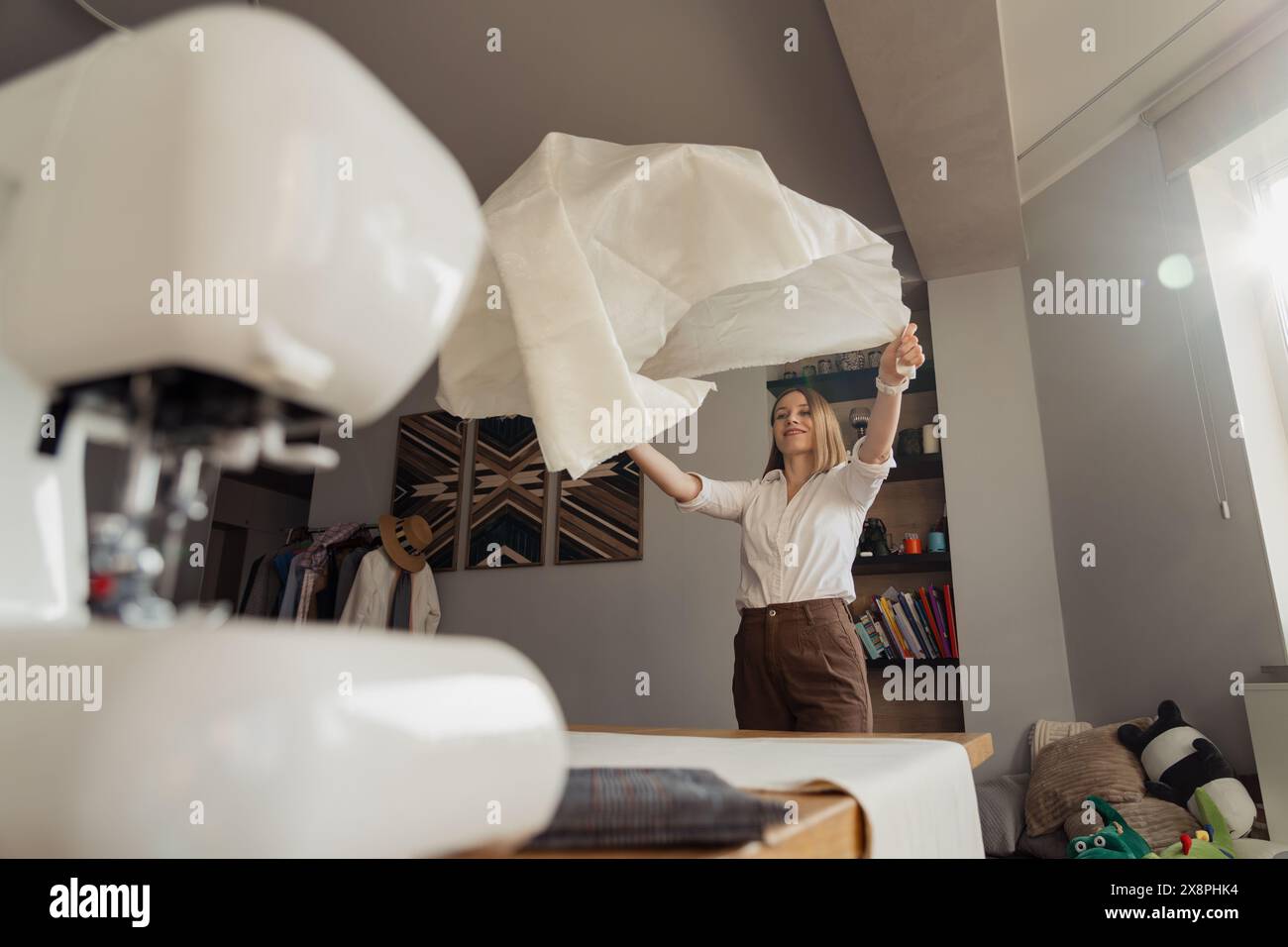 Dressing Client Dress fitting process hi-res stock photography and images - Alamy