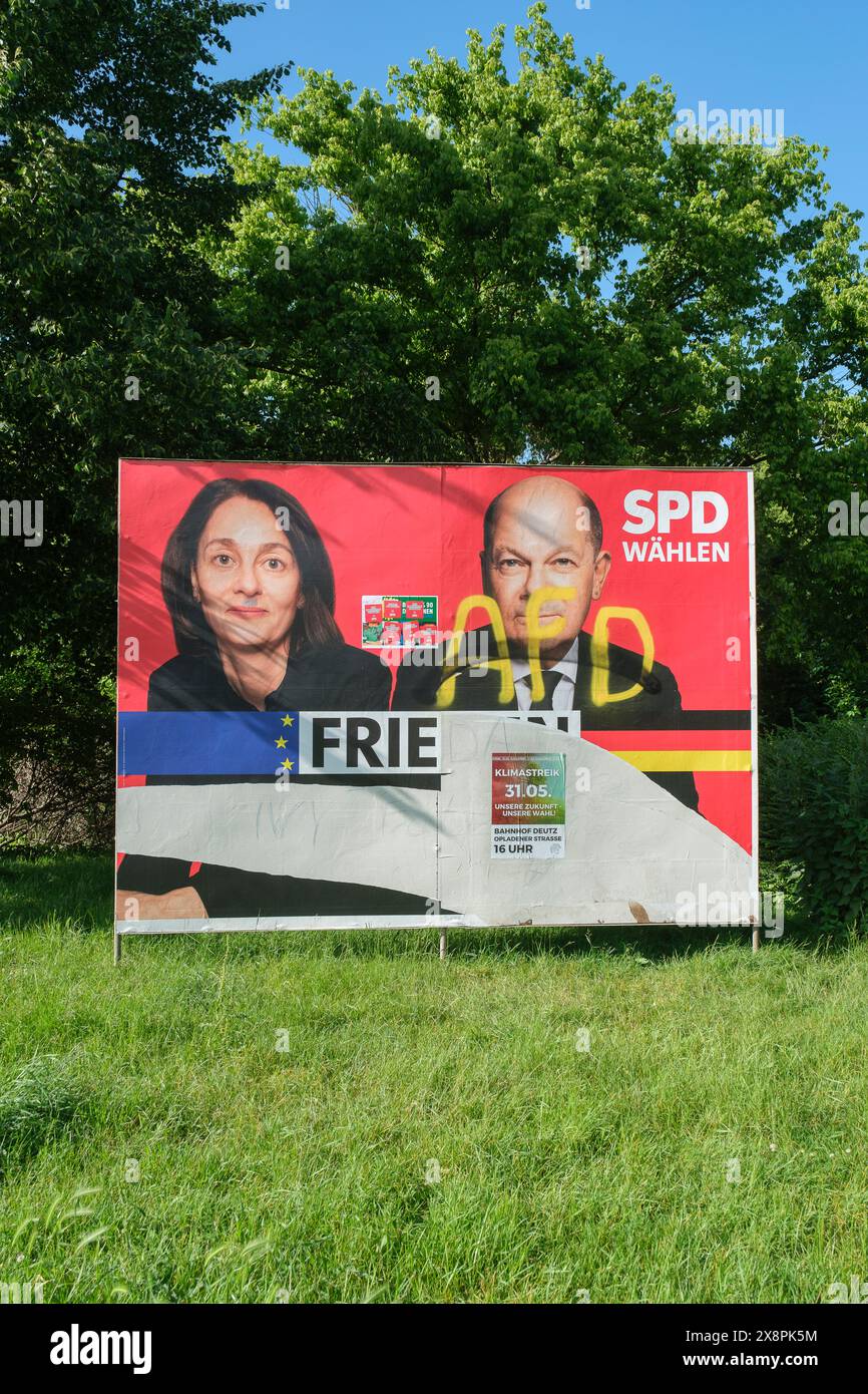 Damaged SPD election poster with AFD lettering and portraits of Olaf ...
