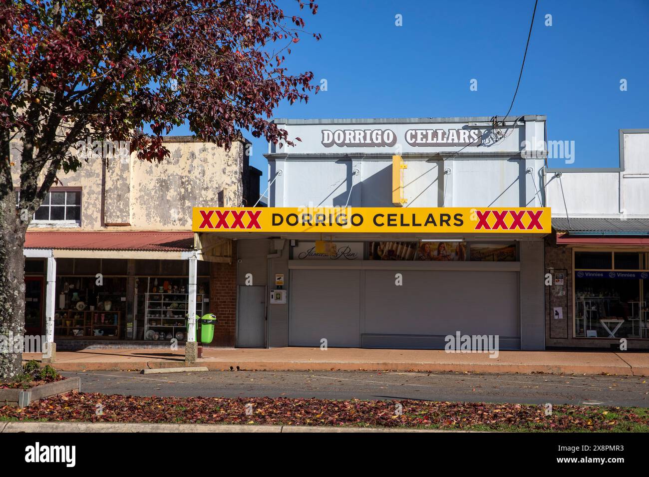 Dorrigo bottle shop and cellars liquor store in Dorrigo town centre, with Castlemaine XXXX branding, NSW,Australia Stock Photo