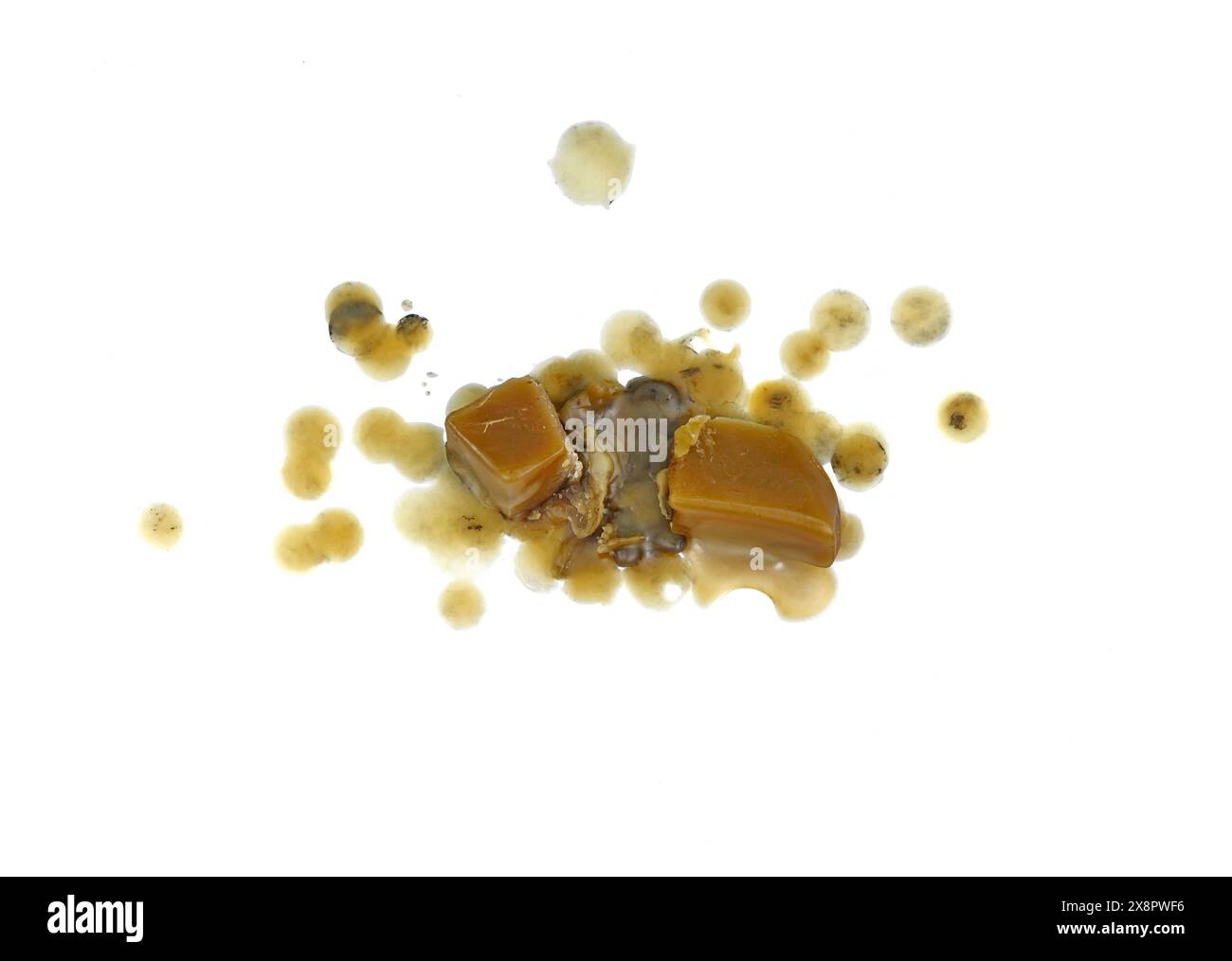 Candle dripping on white isolated. Pure natural Bees Wax (Beeswax