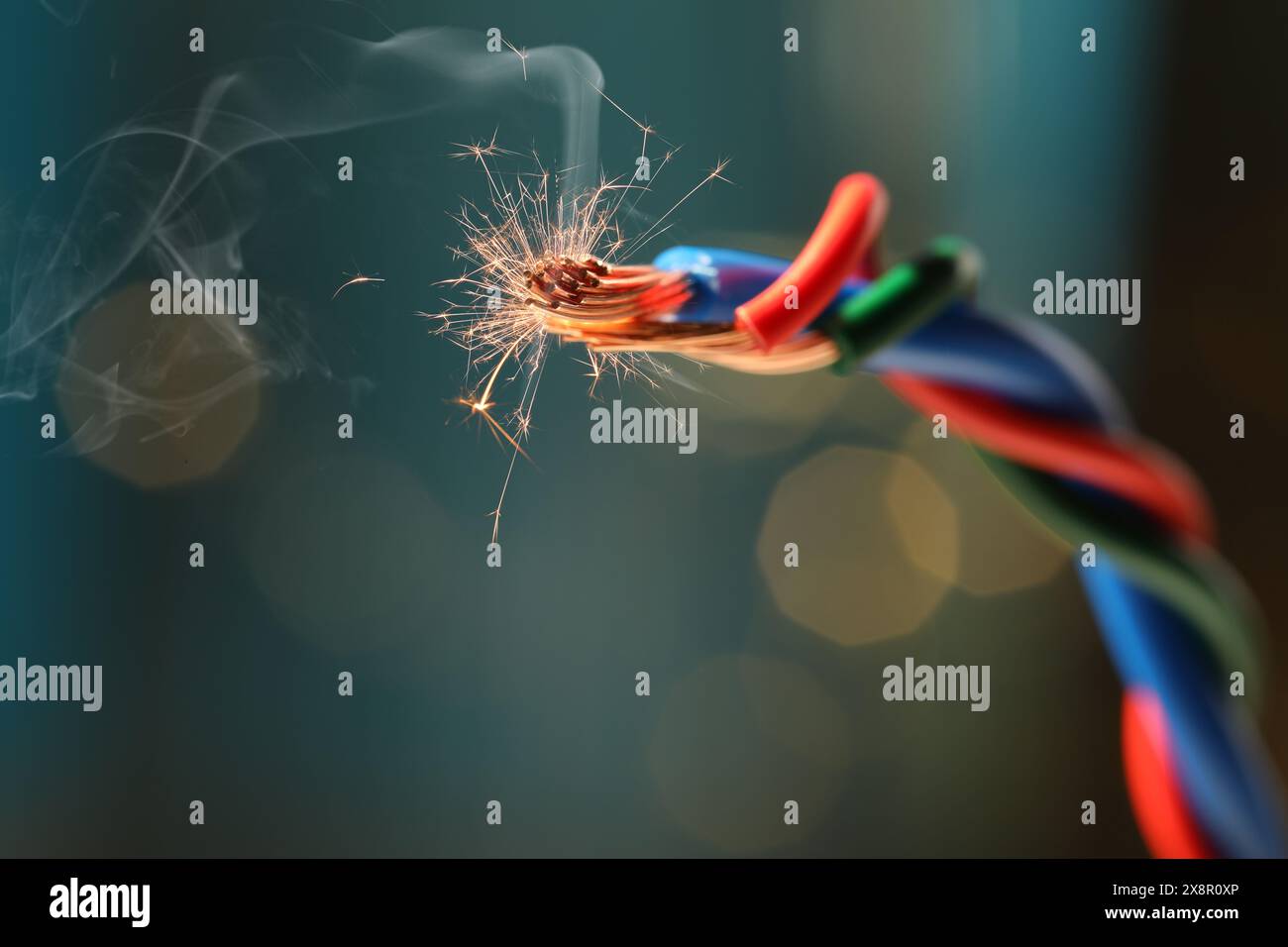 Sparking wiring on blurred background, closeup view Stock Photo