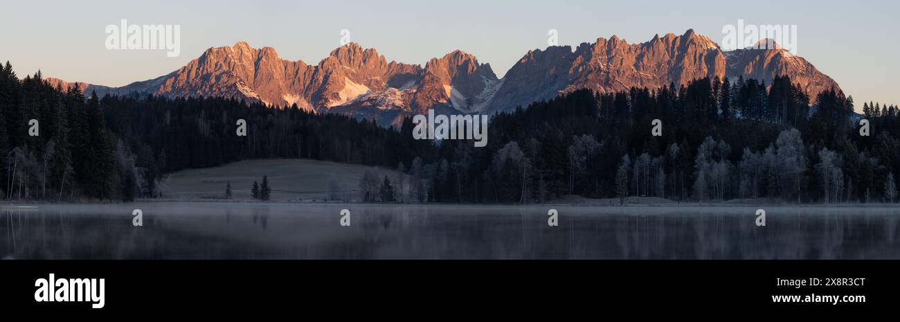 Sunrise at Lake Schwarzsee with Wilder Kaiser in the background Stock Photo