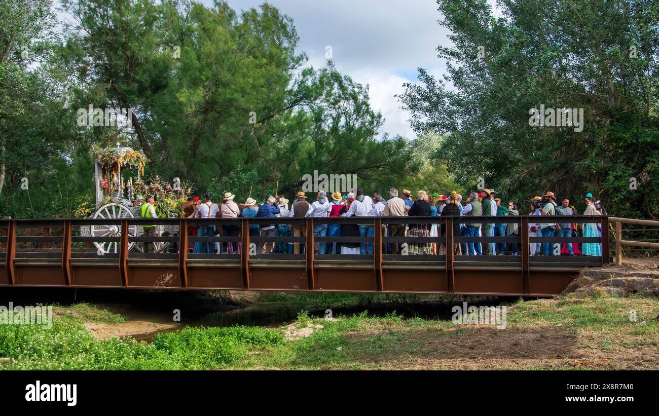 Group of pilgrims praying on the famous Ajoli bridge, entry point to ...