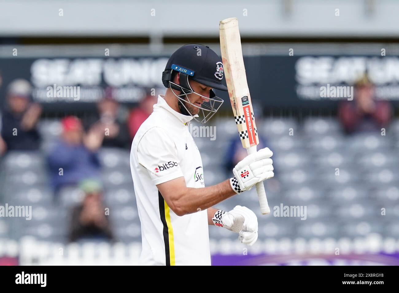 Bristol, UK, 27 May 2024. Gloucestershire's Beau Webster celebrates reaching a half century during the Vitality County Championship match between Gloucestershire and Derbyshire. Credit: Robbie Stephenson/Gloucestershire Cricket/Alamy Live News Stock Photo