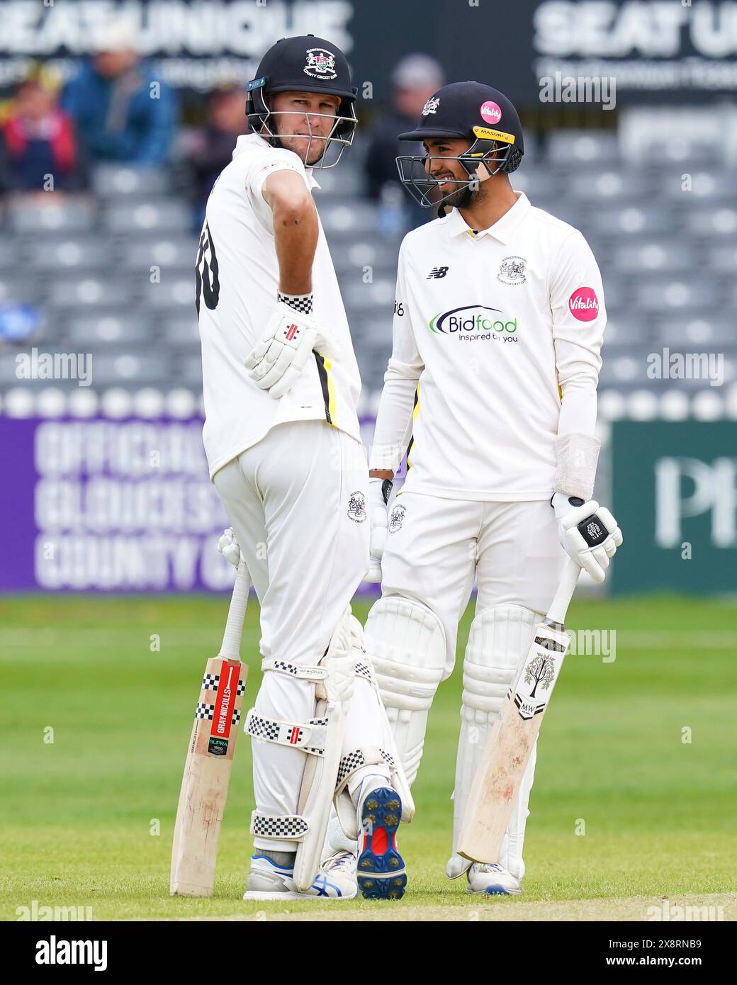 Bristol, UK, 27 May 2024. Gloucestershire's Ajeet Singh Dale and Gloucestershire's Beau Webster during the Vitality County Championship match between Gloucestershire and Derbyshire. Credit: Robbie Stephenson/Gloucestershire Cricket/Alamy Live News Stock Photo