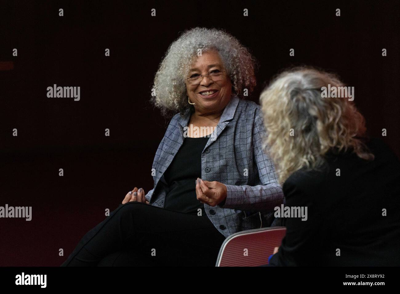 Barcelona, Spain. 27th May, 2024. Angela Davis gives a lecture at Pompeu Fabra University in Barcelona, where she spoke about racism, the Palestine conflict, and capitalism in society and universities. Angela Davis pronuncia una conferencia en la Universidad Pompeu Fabra de Barcelona, donde ha hablado sobre el racismo, el conflicto de Palestina y el capitalismo en la sociedad y las universidades. IN THE PIC:Angela Davis, monica tarribas News politics -Barcelona, Spain monday, may 27, 2024 (Photo by Eric Renom/LaPresse) Credit: LaPresse/Alamy Live News Stock Photo