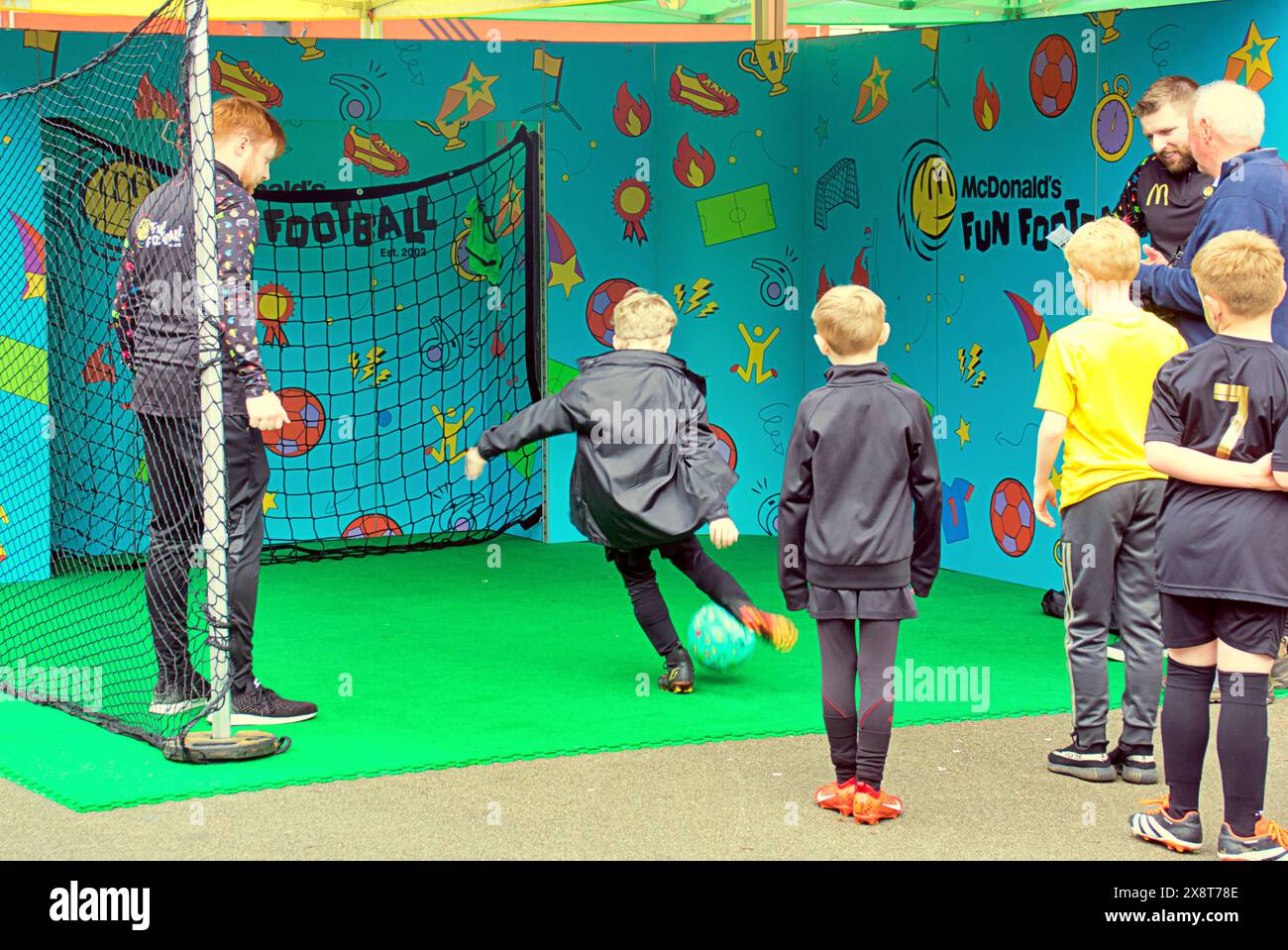 Glasgow, Scotland, UK. 27th May, 2024:McDonalds Fun Football was in the city in george square with the burger giant providing soccer fun for kids. Credit Gerard Ferry /Alamy Live News Stock Photo