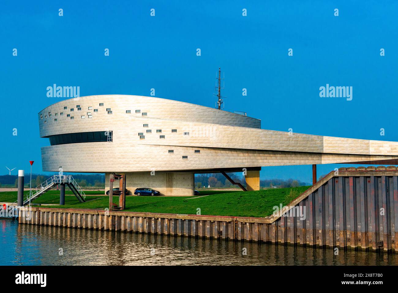 Harbour Terminal Office Building Nijmegen, Netherlands. Architectureal designed Head Quarters / HQ and office building at Nijmegen s harbour container terminal during a sunny, spring day. Nijmegen Waalkade / Containereterminal Gelderland Nederland Copyright: xGuidoxKoppesxPhotox Stock Photo