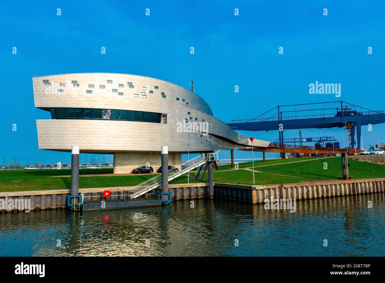 Harbour Terminal Office Building Nijmegen, Netherlands. Architectureal designed Head Quarters / HQ and office building at Nijmegen s harbour container terminal during a sunny, spring day. Nijmegen Waalkade / Containereterminal Gelderland Nederland Copyright: xGuidoxKoppesxPhotox Stock Photo