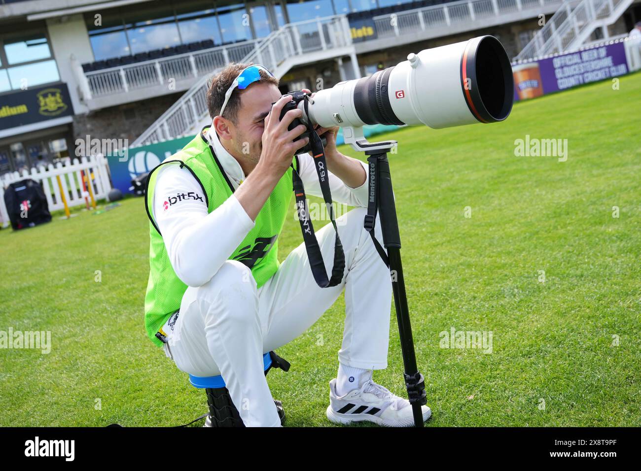 Bristol, UK, 27 May 2024. Gloucestershire's Zaman Akhter takes pictures during the Vitality County Championship match between Gloucestershire and Derbyshire. Credit: Robbie Stephenson/Gloucestershire Cricket/Alamy Live News Stock Photo
