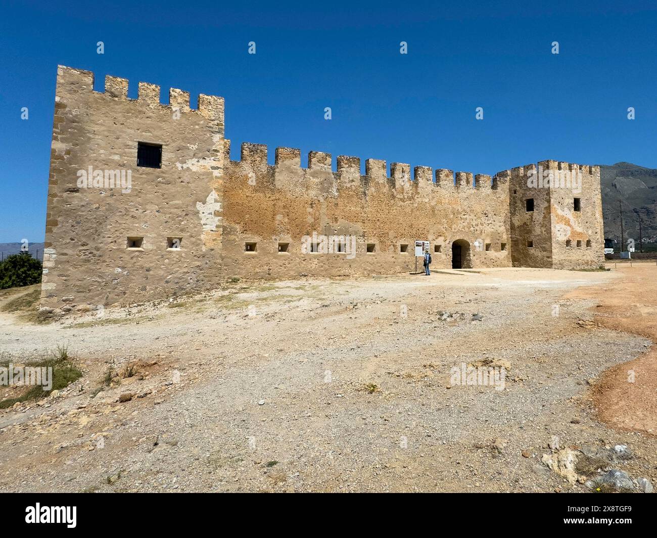 Exterior view with two corner towers walls battlements entrance of Fort Fortezza Fortetza Frangokastello built by Republic of Venice in 14th century Stock Photo