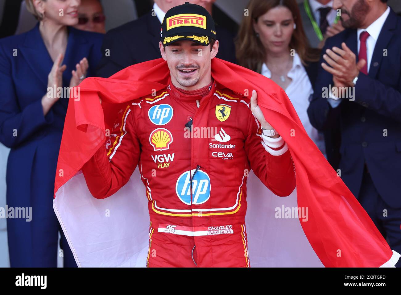 Charles Leclerc of Scuderia Ferrari  celebrates victory on the podium after  the F1 Grand Prix of Monaco at Circuit de Monaco on May 26, 2024 in Monte-Carlo, Monaco. Stock Photo