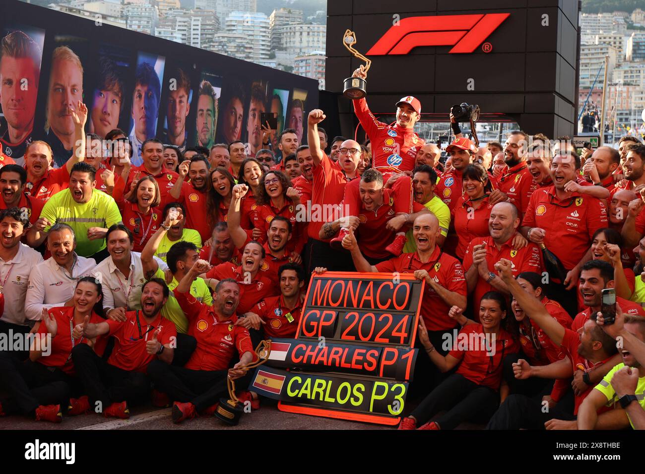 Charles Leclerc celebrates with the team of Scuderia Ferrari the ...