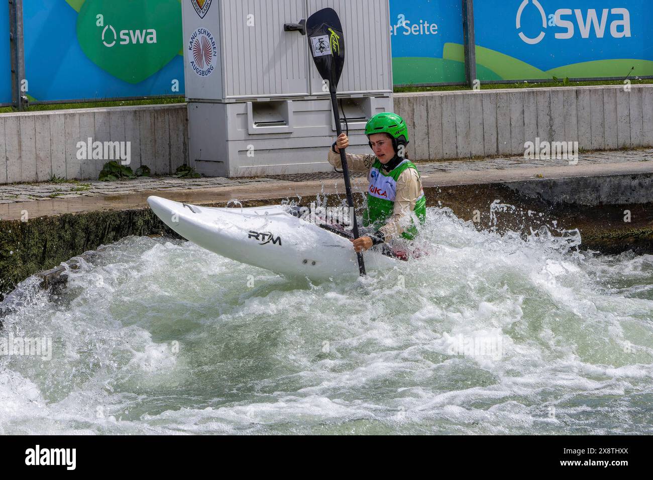 Kayak competition on the Augsburg ice canal with kayak paddlers, kayak ...