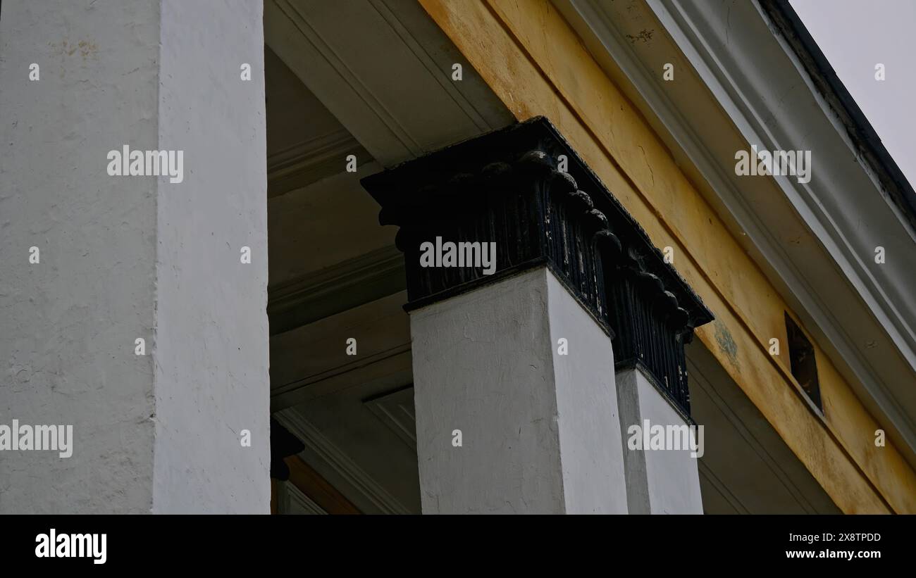 Abandoned 19th century palace with columns. Stock footage. Old manor house exterior. Stock Photo