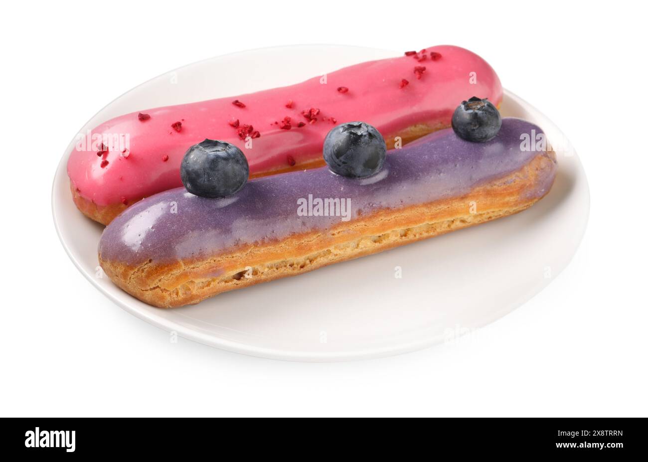 Delicious eclairs covered with glaze isolated on white Stock Photo
