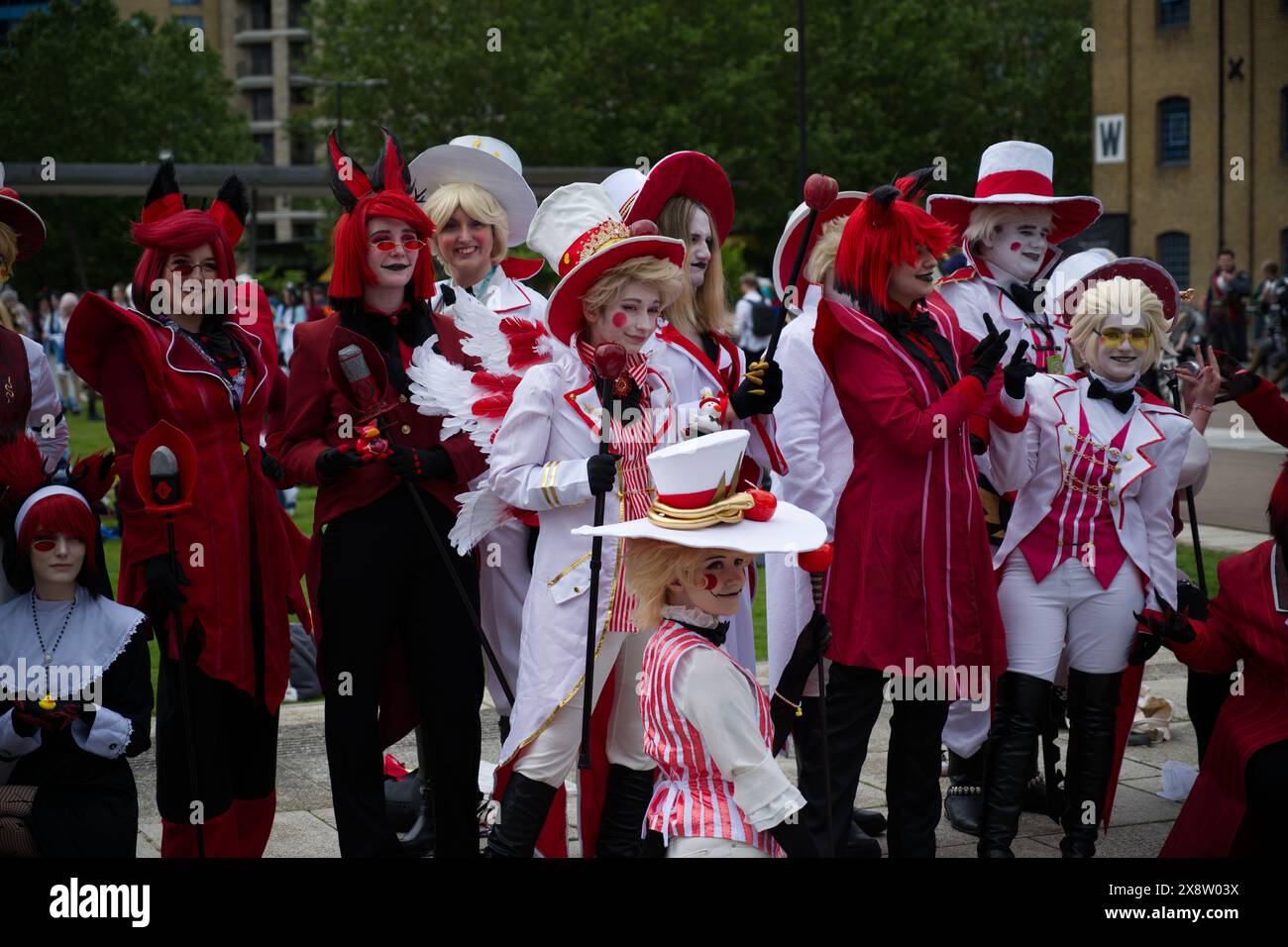 A group of male and female Cosplay people pose for photos at MCM Comic Con in London Stock Photo