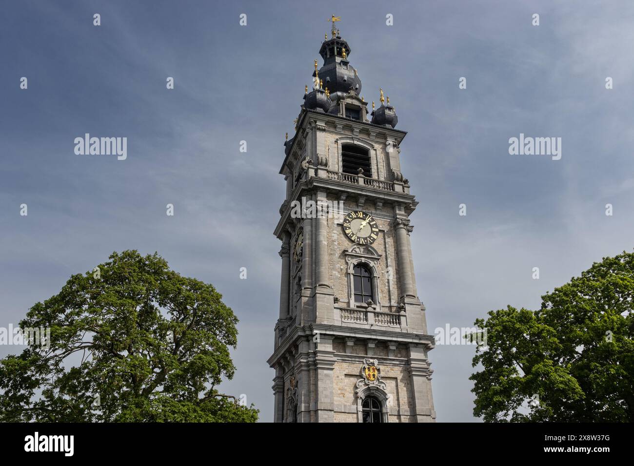 The beautiful Baroque style Belfry of Mons, in Hainaut, Belgium. Built in 1672 it overlooks the city in Parc de Chateau. Stock Photo