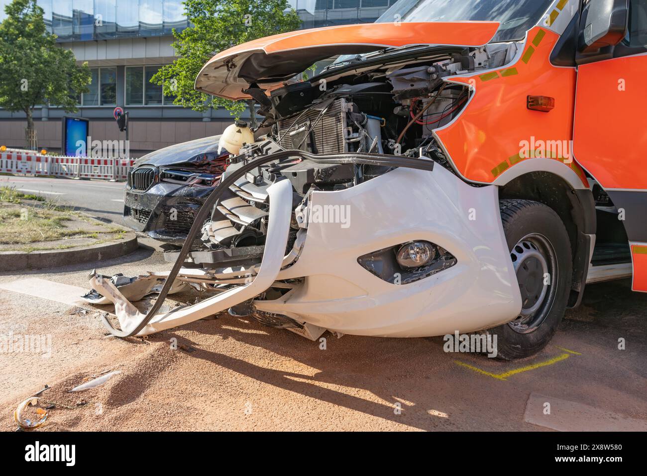 Granules to bind oil under destroyed ambulance Stock Photo