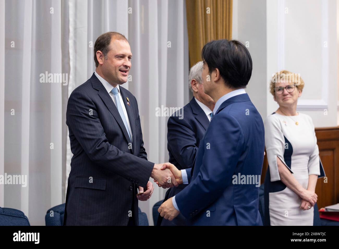 Taipei, Republic of, China. 27th May, 2024. U.S Rep. Andy Barr, R-KY, left, part of a bipartisan delegation, shakes hands with Taiwan President Lai Ching-te, right, before the meeting at the Presidential Office, May 27, 2024, in Taipei, Taiwan. The visit was the first by American politicians since Lai took office last week. Credit: Liu Shu Fu/Taiwan Presidential Office/Alamy Live News Stock Photo