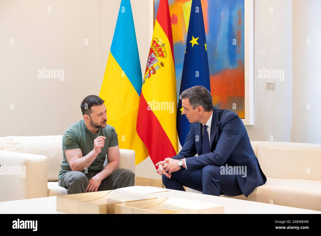 Madrid, Spain. 27th May, 2024. Ukrainian President Volodymyr Zelensky (left) speaks with Spanish Prime Minister Pedro Sanchez (right) at Moncloa Palace in Madrid. Both have signed a bilateral security agreement, which includes military supplies ranging from Patriot missiles to Leopard tanks, amounting to 1.129 billion euros. (Photo by Miguel Candela/SOPA Images/Sipa USA) Credit: Sipa USA/Alamy Live News Stock Photo