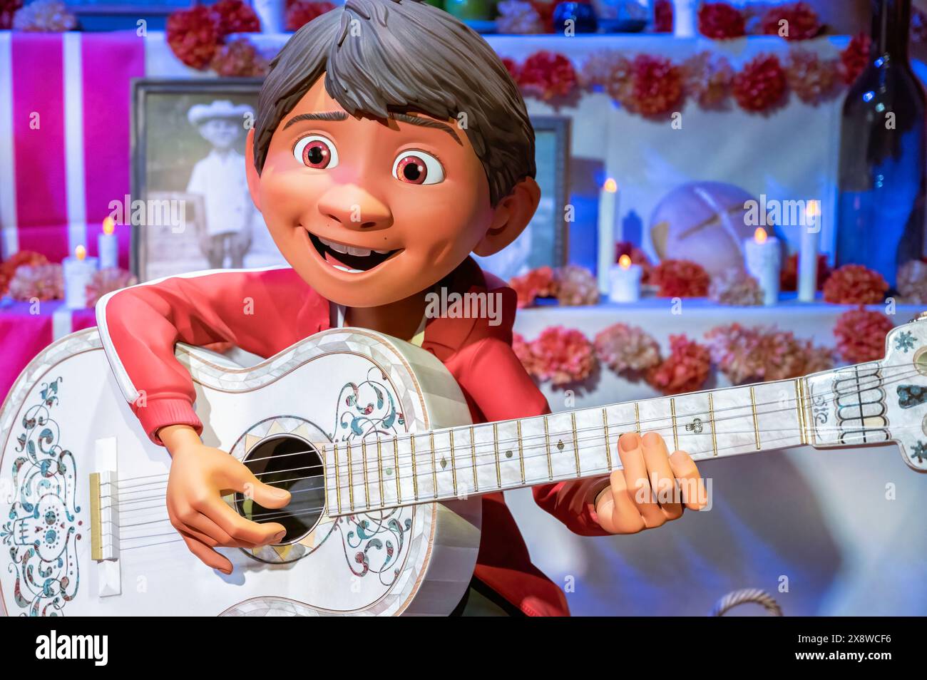 Madrid, Spain; 05-14-2024: Large figure of the famous character Miguel from the movie Coco in an exhibition called Pixar World about the studio's film Stock Photo