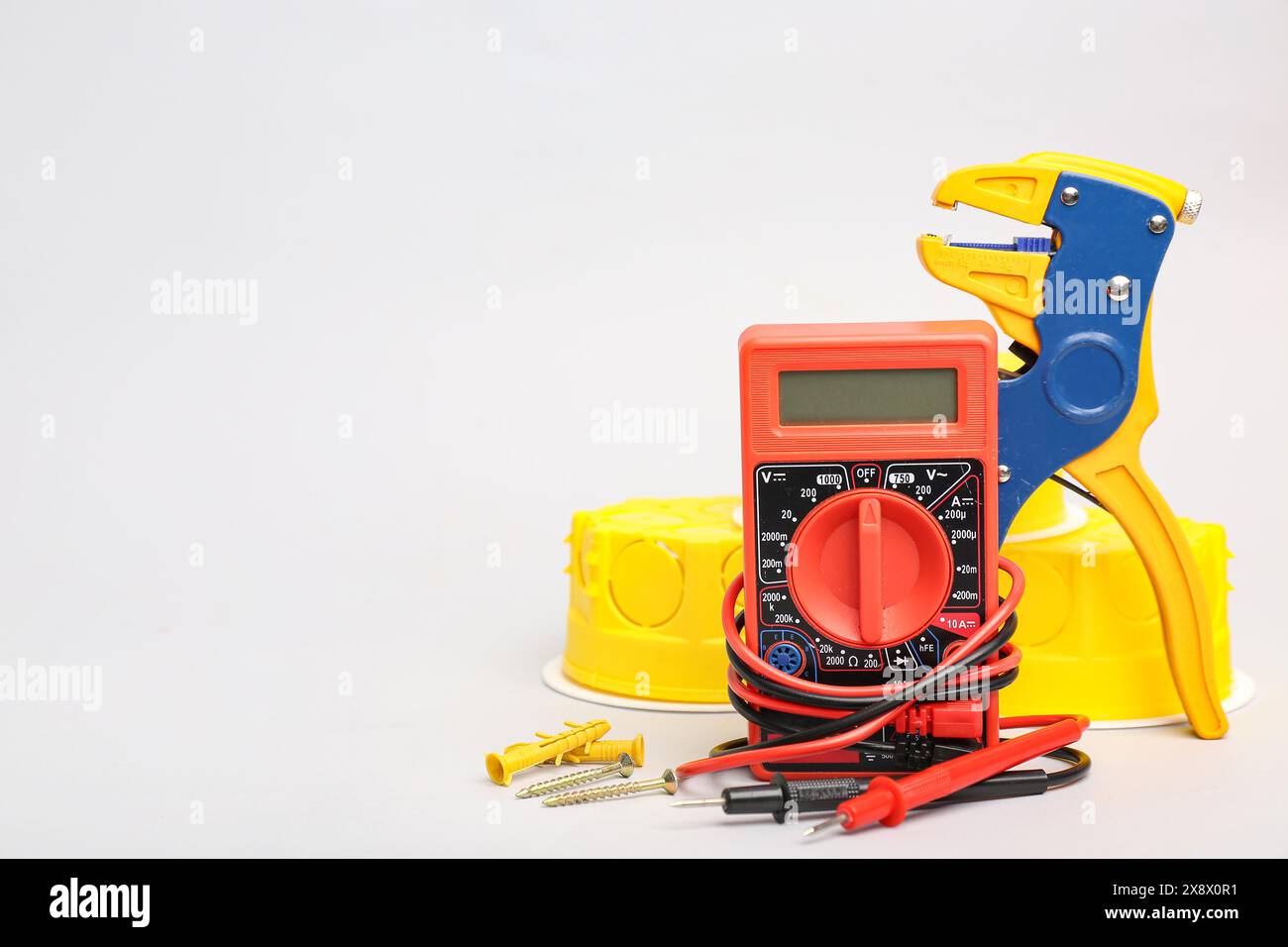 Set of electrician's tools with multimeter on light background Stock ...