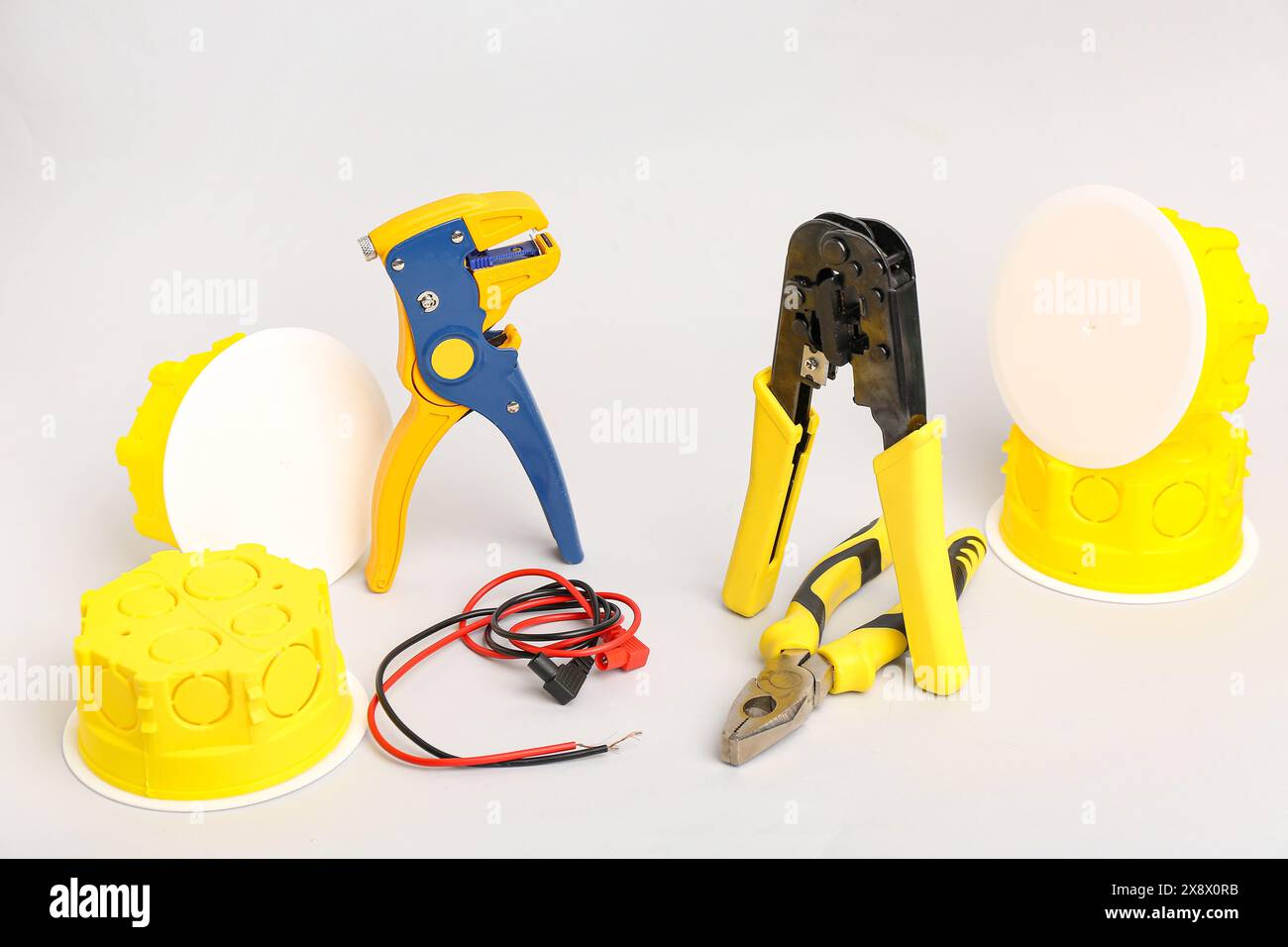 Electrician's tools on light background Stock Photo
