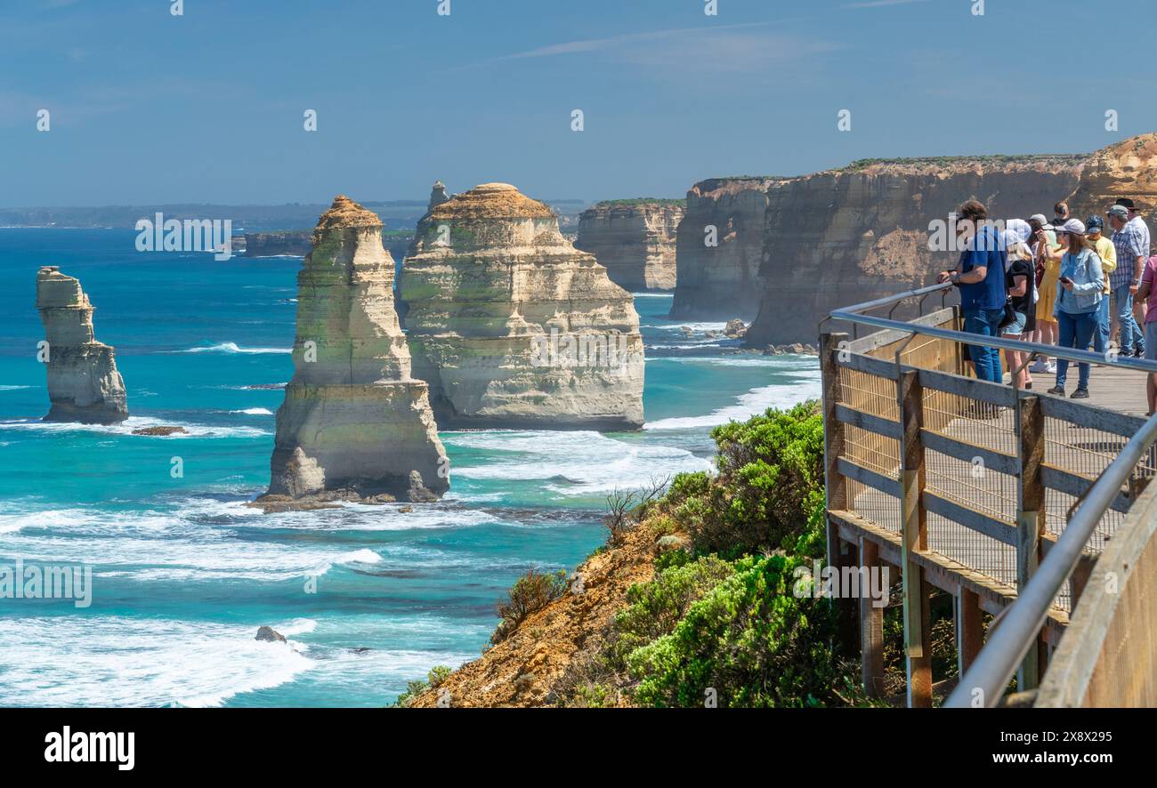 Sightseers and tourists at the 'Twelve Apostles' limestone sea stacks at Port Campbell National Park on the Great Ocean Road in Victoria, Australia. Stock Photo