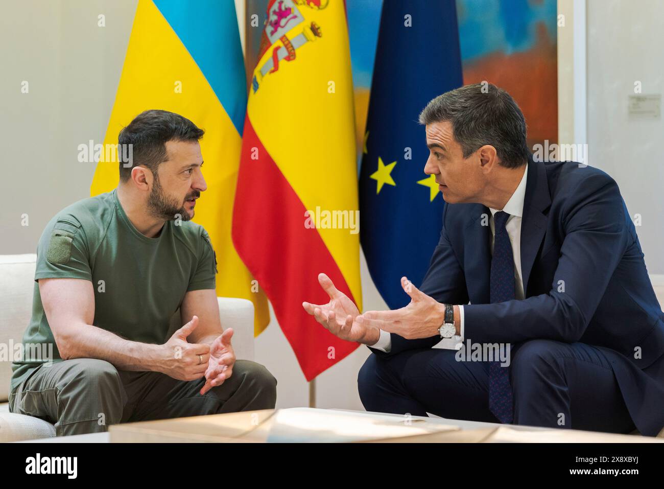 Madrid, Spain. 27th May, 2024. The President of Ukraine Volodymyr Zelenskyy (L) and Spanish Prime Minister Pedro Sanchez (R) ares seen during a meeting at Moncloa Palace in Madrid. Spain and Ukraine sign a bilateral security agreement: 'Defense, security, peace, and reconstruction are our priorities.' Credit: SOPA Images Limited/Alamy Live News Stock Photo
