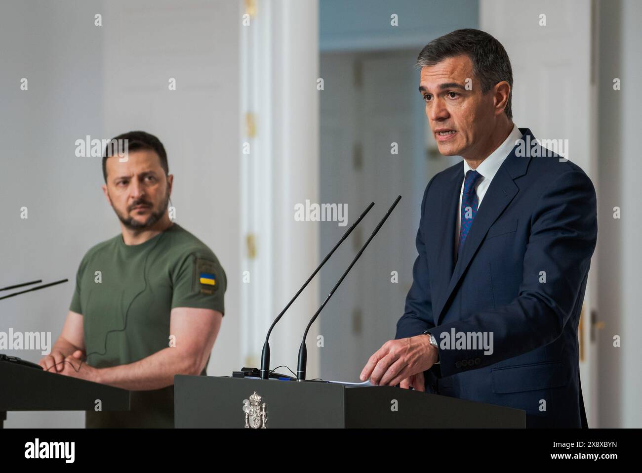 Madrid, Spain. 27th May, 2024. President of Ukraine, Volodymyr Zelenskyy and the Prime Minister of Spain Pedro Sanchez, speak during a press conference at the Moncloa Palace in Madrid. Spain and Ukraine sign a bilateral security agreement: 'Defense, security, peace, and reconstruction are our priorities.' Credit: SOPA Images Limited/Alamy Live News Stock Photo