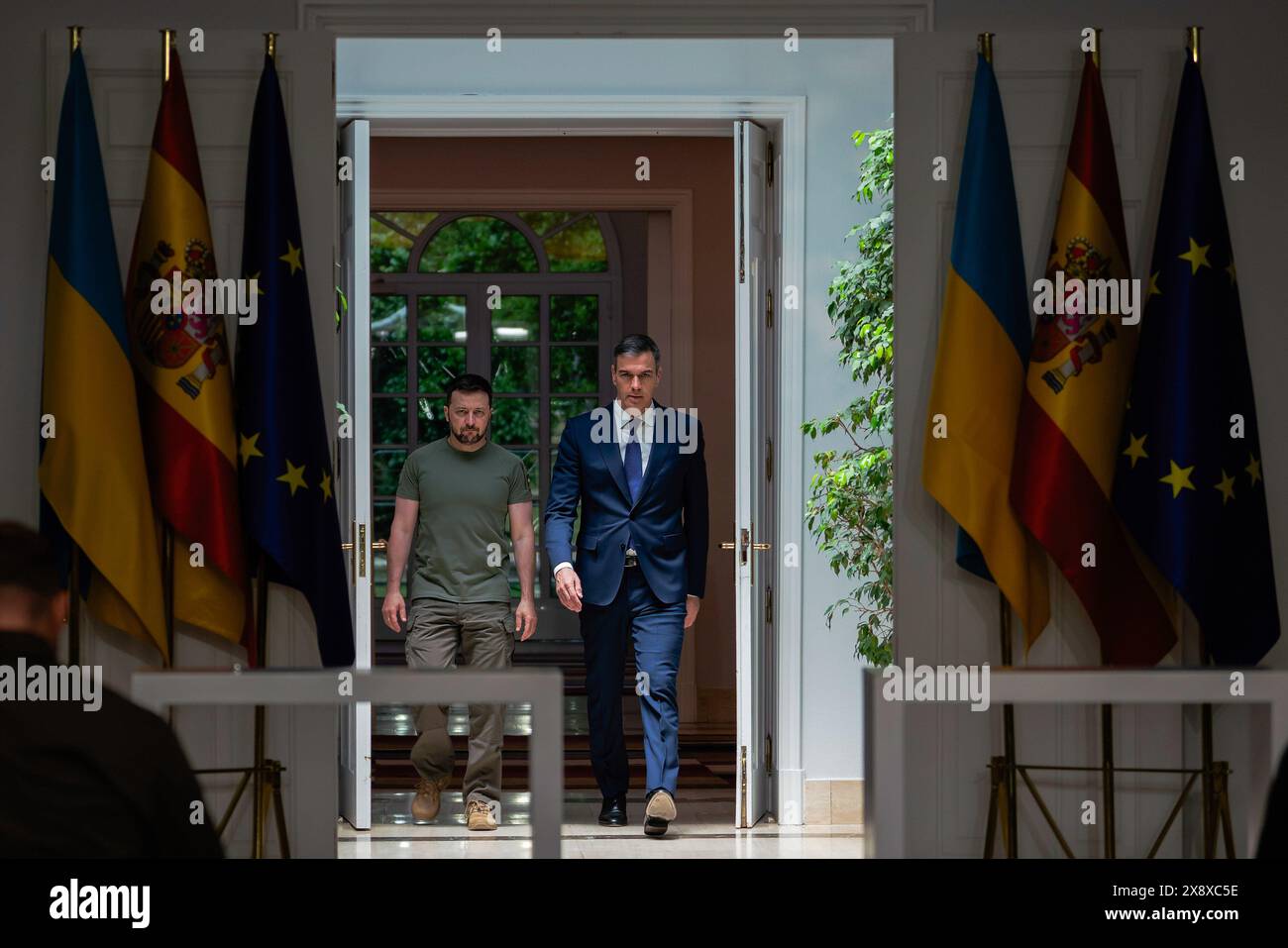 Madrid, Spain. 27th May, 2024. President of Ukraine Volodymyr Zelenskyy (L) and Spanish Prime Minister Pedro Sanchez (R) arrive to a press conference at Moncloa Palace in Madrid. Spain and Ukraine sign a bilateral security agreement: 'Defense, security, peace, and reconstruction are our priorities.' (Photo by Guillermo Gutierrez Carrascal/SOPA Images/Sipa USA) Credit: Sipa USA/Alamy Live News Stock Photo