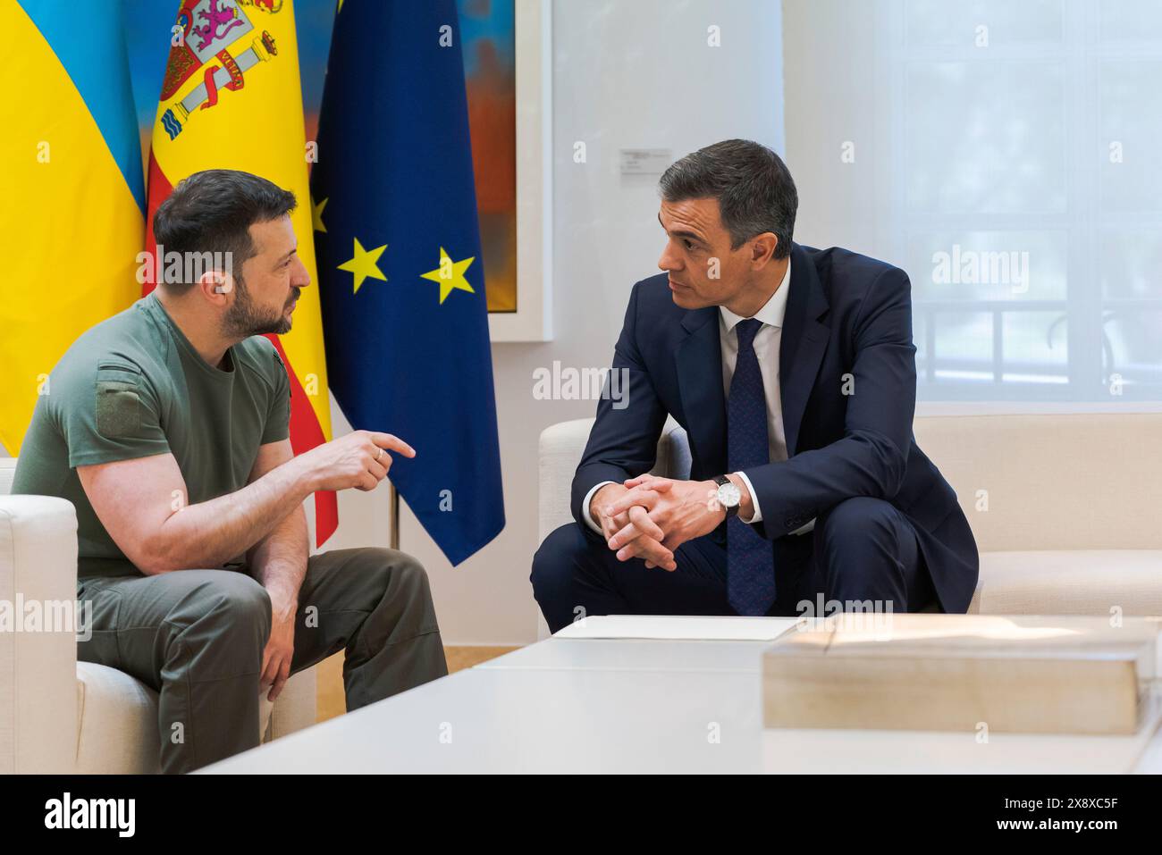 Madrid, Spain. 27th May, 2024. The President of Ukraine Volodymyr Zelenskyy (L) and Spanish Prime Minister Pedro Sanchez (R) ares seen during a meeting at Moncloa Palace in Madrid. Spain and Ukraine sign a bilateral security agreement: 'Defense, security, peace, and reconstruction are our priorities.' (Photo by Guillermo Gutierrez Carrascal/SOPA Images/Sipa USA) Credit: Sipa USA/Alamy Live News Stock Photo